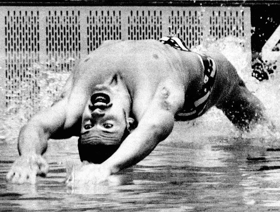 1976: American swimmer John Naber at the Olympic Games men's 100-meter backstroke final in Montreal. Naber won the gold medal and set a world record time of 55.59.