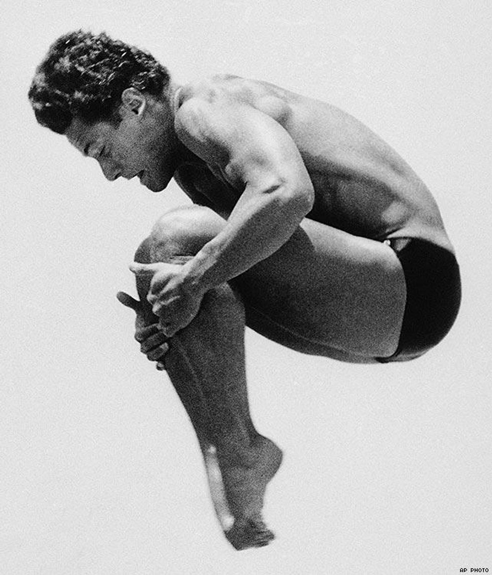 1984: Greg Louganis does a back 3-1/2 somersault with tuck in Los Angeles. Louganis rang up five perfect scores of 10.0 and became the first man since 1928 to win two diving gold medals in one Olympics.