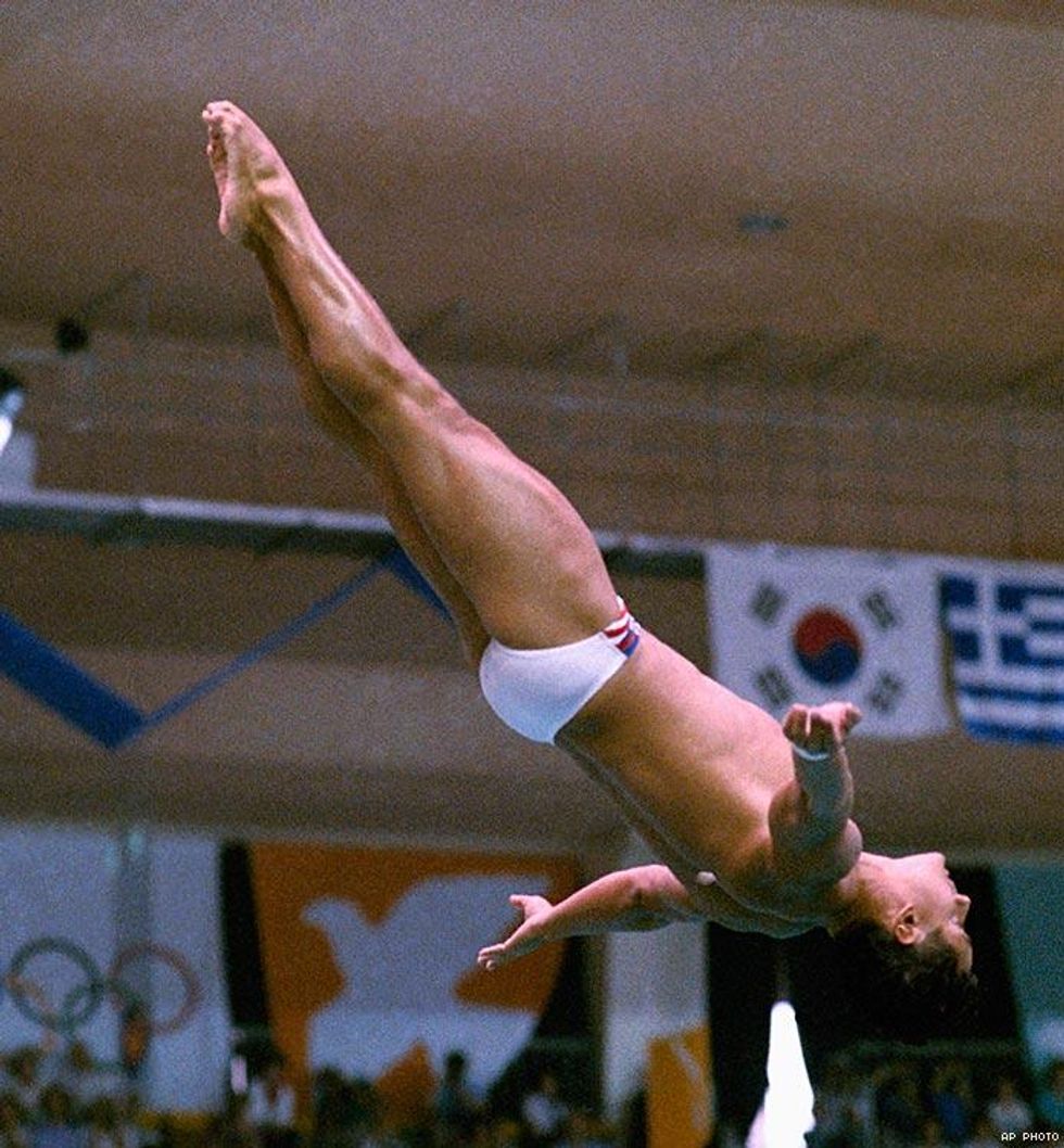 1988: Greg Louganis glides toward the pool during men's springboard preliminary competition in Seoul.