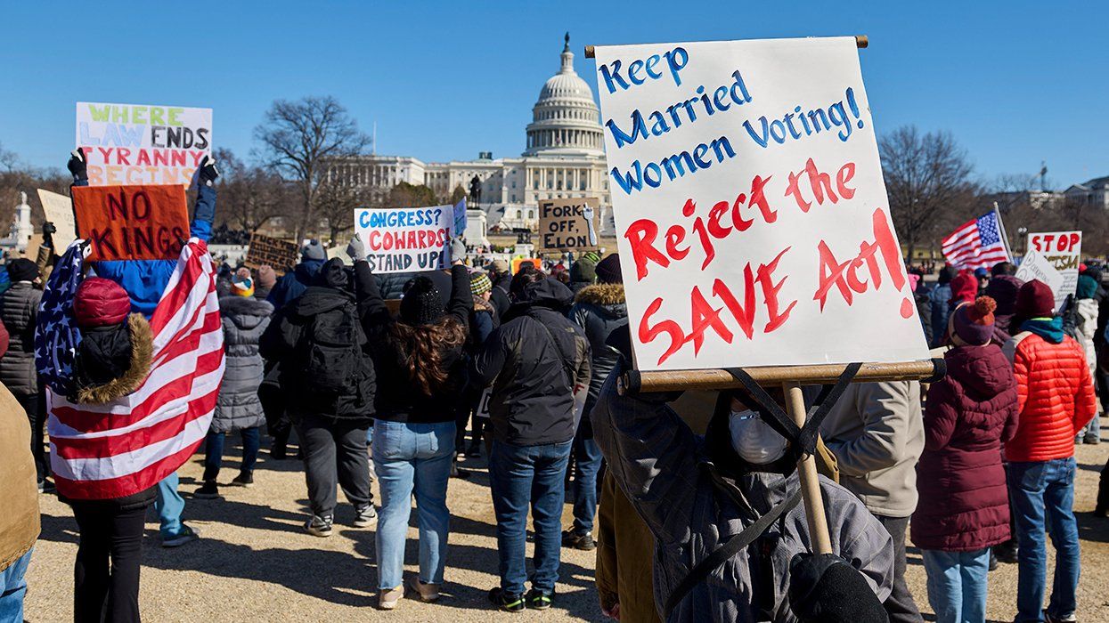50501 Presidents' Day 2025 protest outside Capitol building Washington, D.C., with signs say ingreject the SAVE act no kings