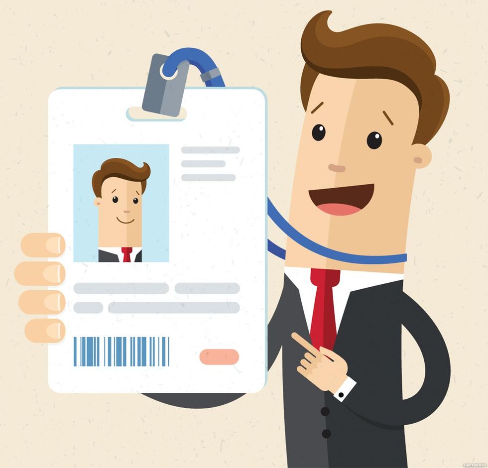 A graphic of an employee holding an ID badge.