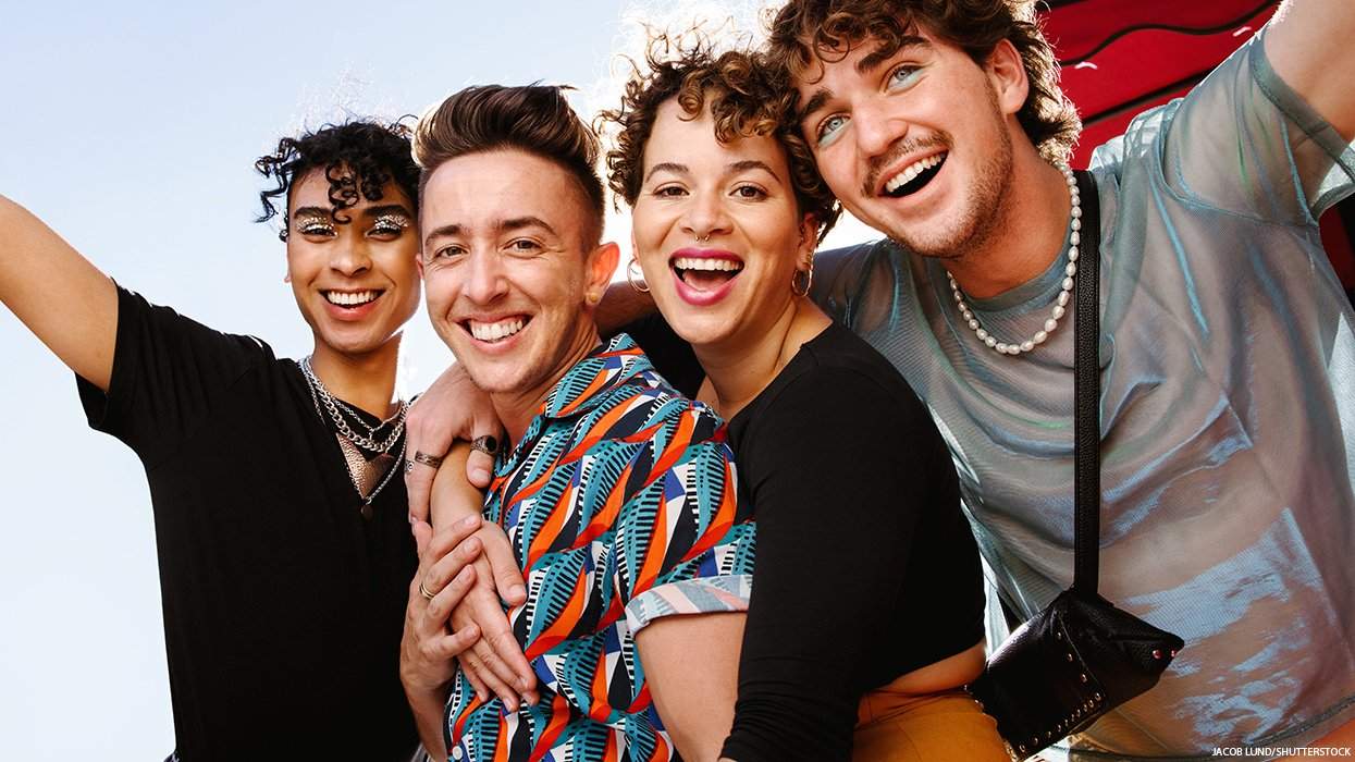 A group of young people smiling.