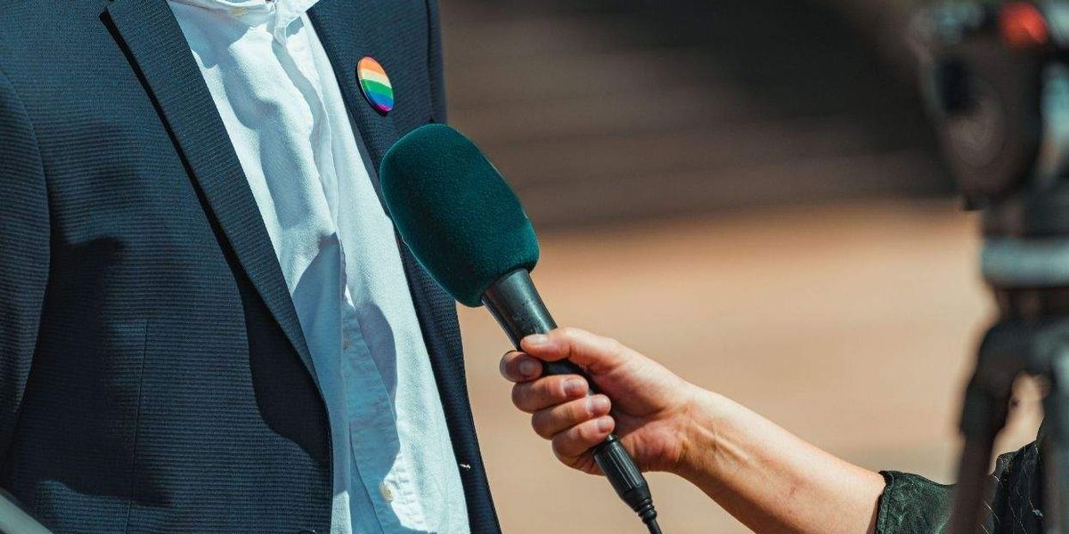 a-journalist-interviewing-somebody-with-