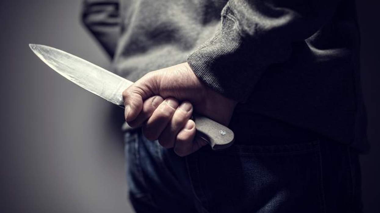 A man holding a knife