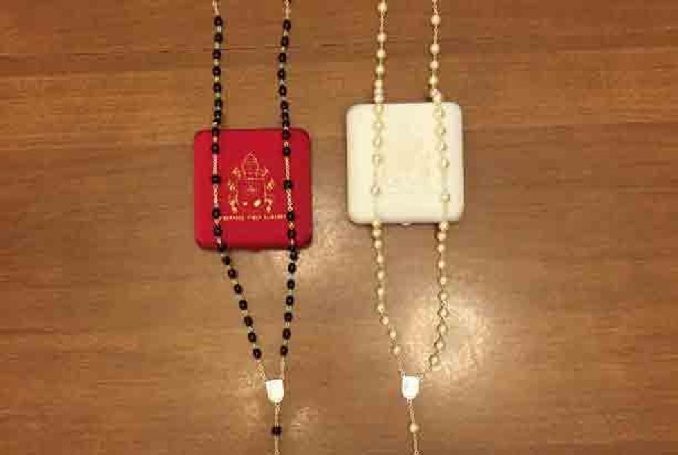 A pair of rosaries Liberty Counsel claims Pope Francis gave to Kim Davis