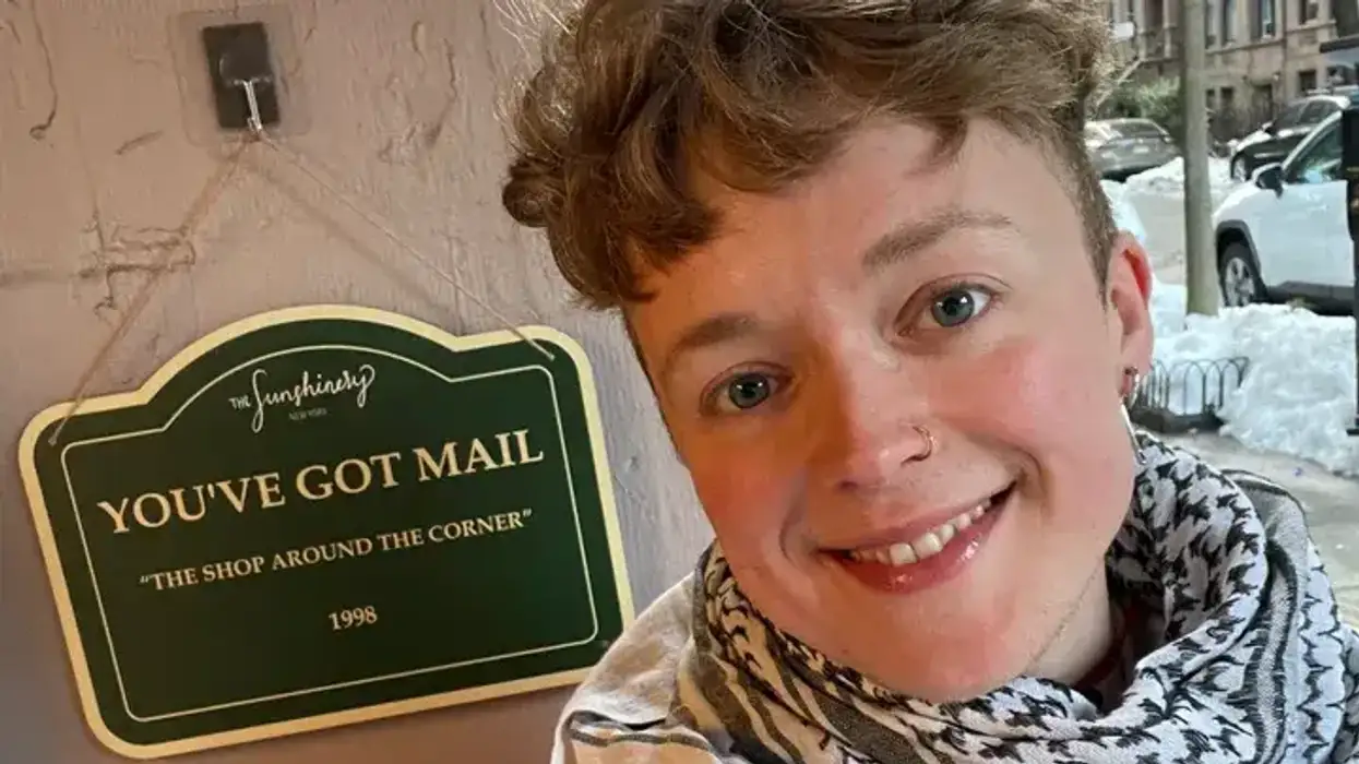 A person smiles for a selfie.