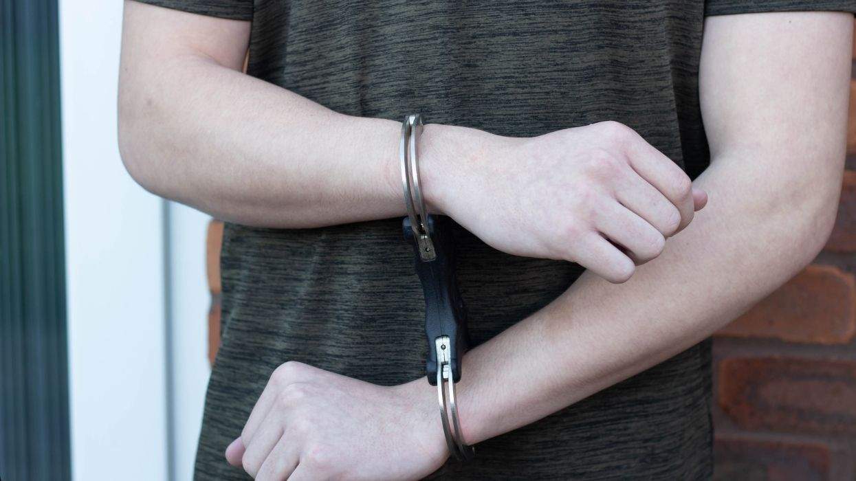 a person wearing handcuffs