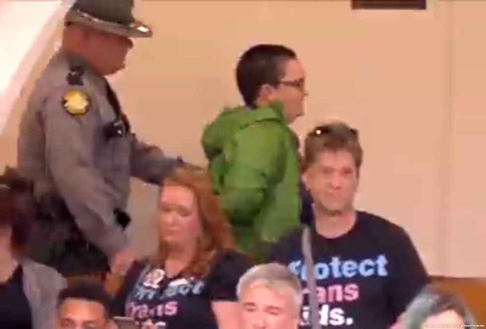 A protester is arrested.