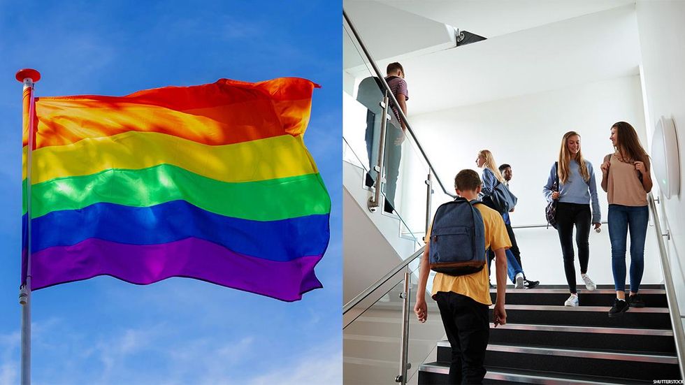 A rainbow Pride flag and students walking up a stairwell with backpacks on.