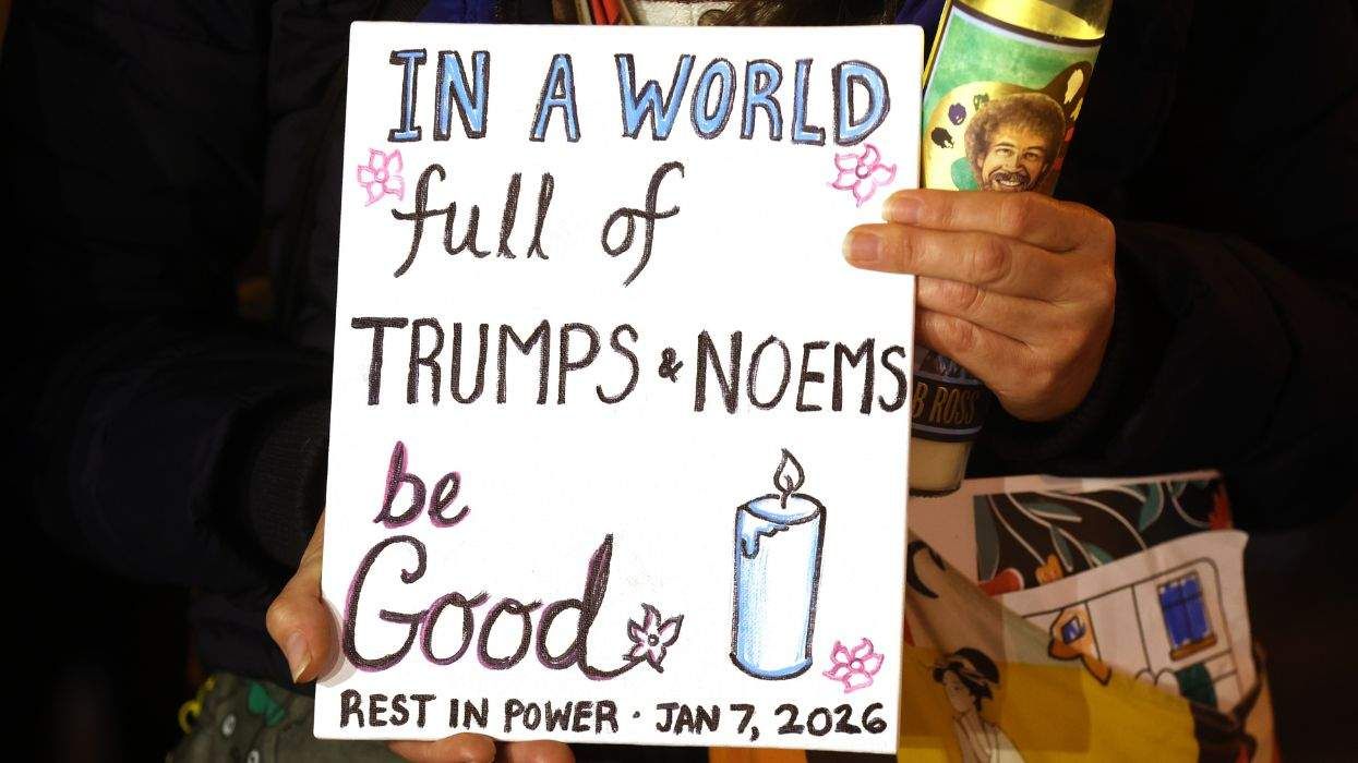 A sign at a vigil for Renee Good in Oakland, California