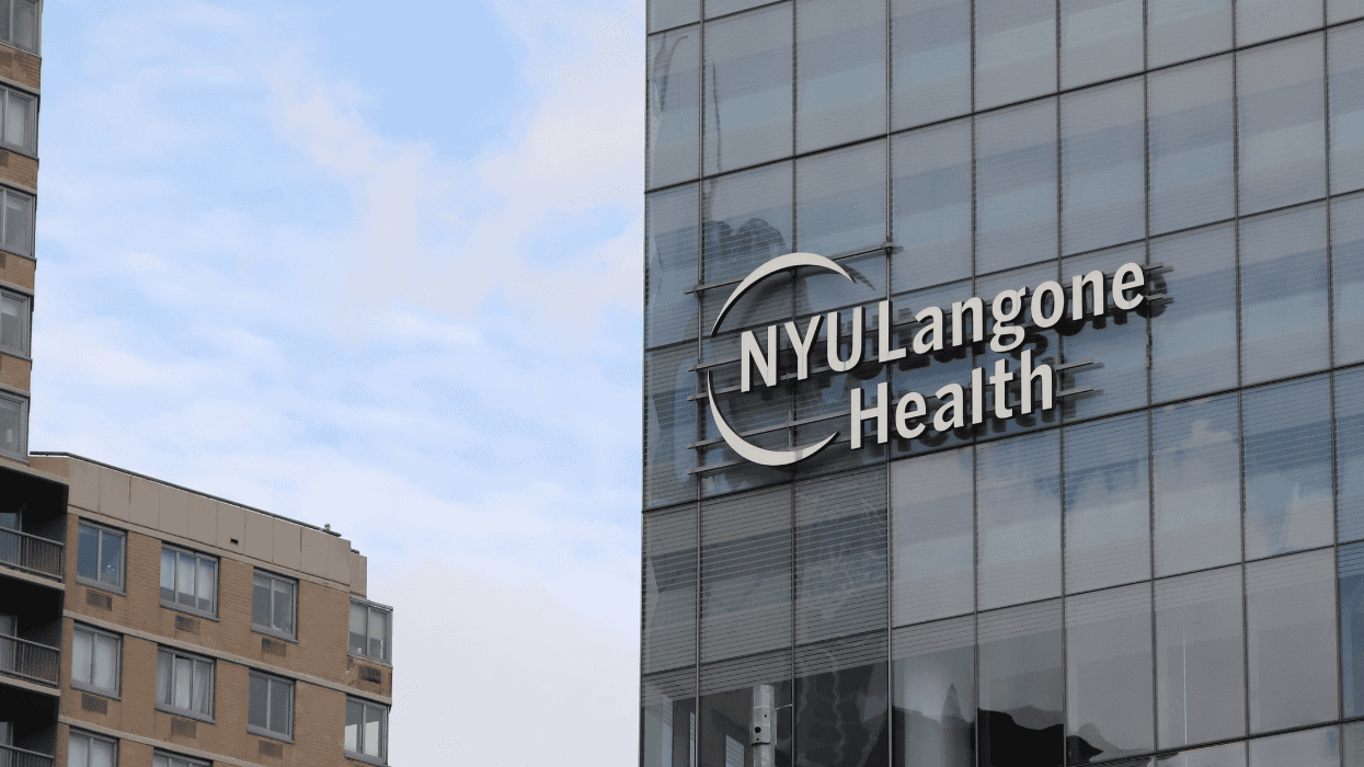 A sign on a glass-paned building reads "NYU Langone Health."