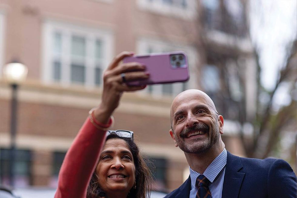 A supporter snaps a selfie with Dr. Daskalakis in Atlanta, Georgia