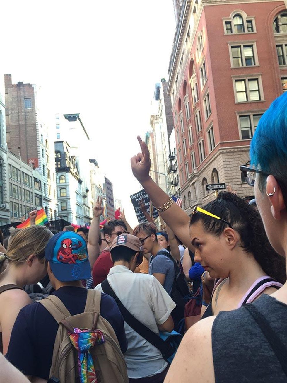 A tender embrace during the moment of silence for the Pulse nightclub shooting victims.