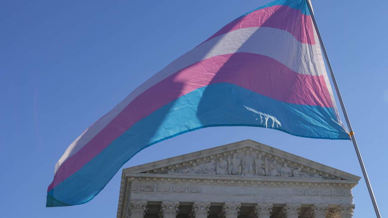 A trans Pride flag waives outside the Supreme Court.