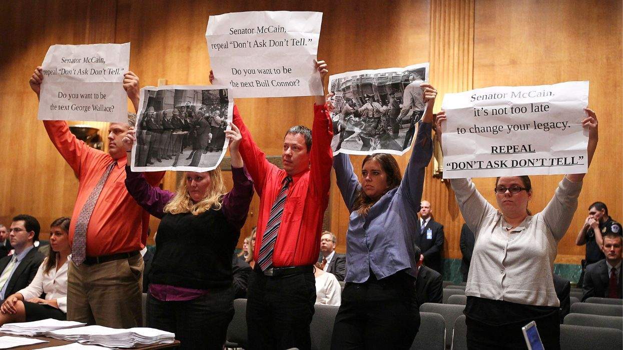 Activists (from left) Jimmy Gruender, Meg Sneed, Paul Roark, Mandee Rowley, and Marilee Cornelius protest DADT at a Senate Armed Services Committee meeting, September 16, 2010.