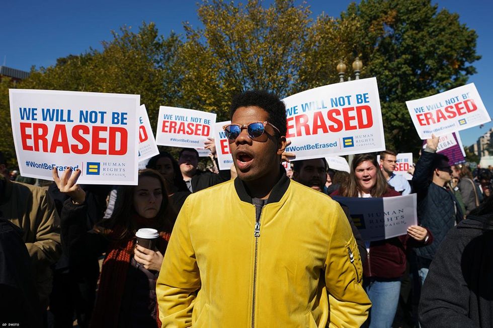 Activists protested the Trump administration's latest anti-transgender move in from of the White House Monday.