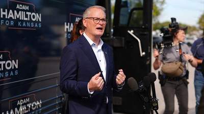 Kansas Democratic Senate candidate Adam Hamilton takes questions from the press during his Kick Off Bus Tour event on October 24, 2026, in Olathe, Kansas