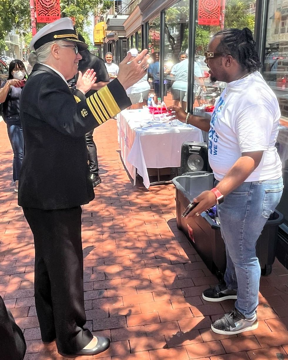 Admiral Levine and person at the event