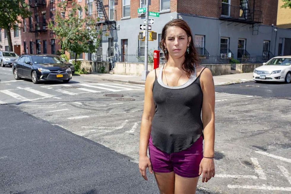 Aeliana Boyer at the intersection where she was allegedly hit by a FDNY ambulance