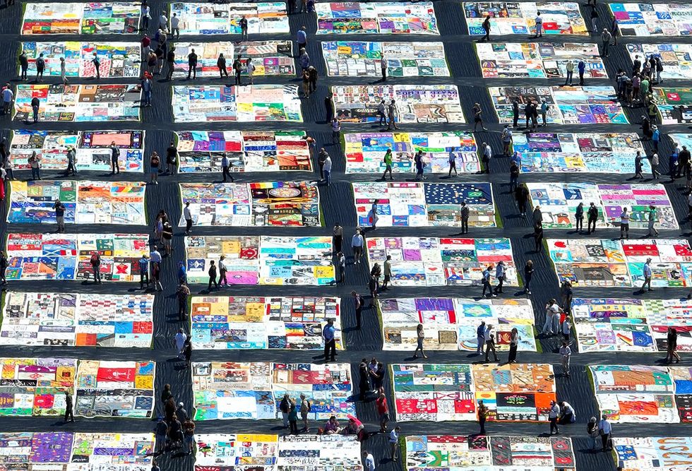 aerial view over 3000 panels of the AIDS Memorial Quilt Robin Williams Meadow Golden Gate Park June 2022 San Francisco California