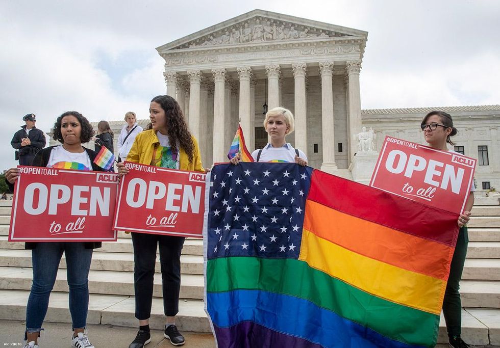 American Civil Liberties Union activists demonstrate in front of the Supreme Court.