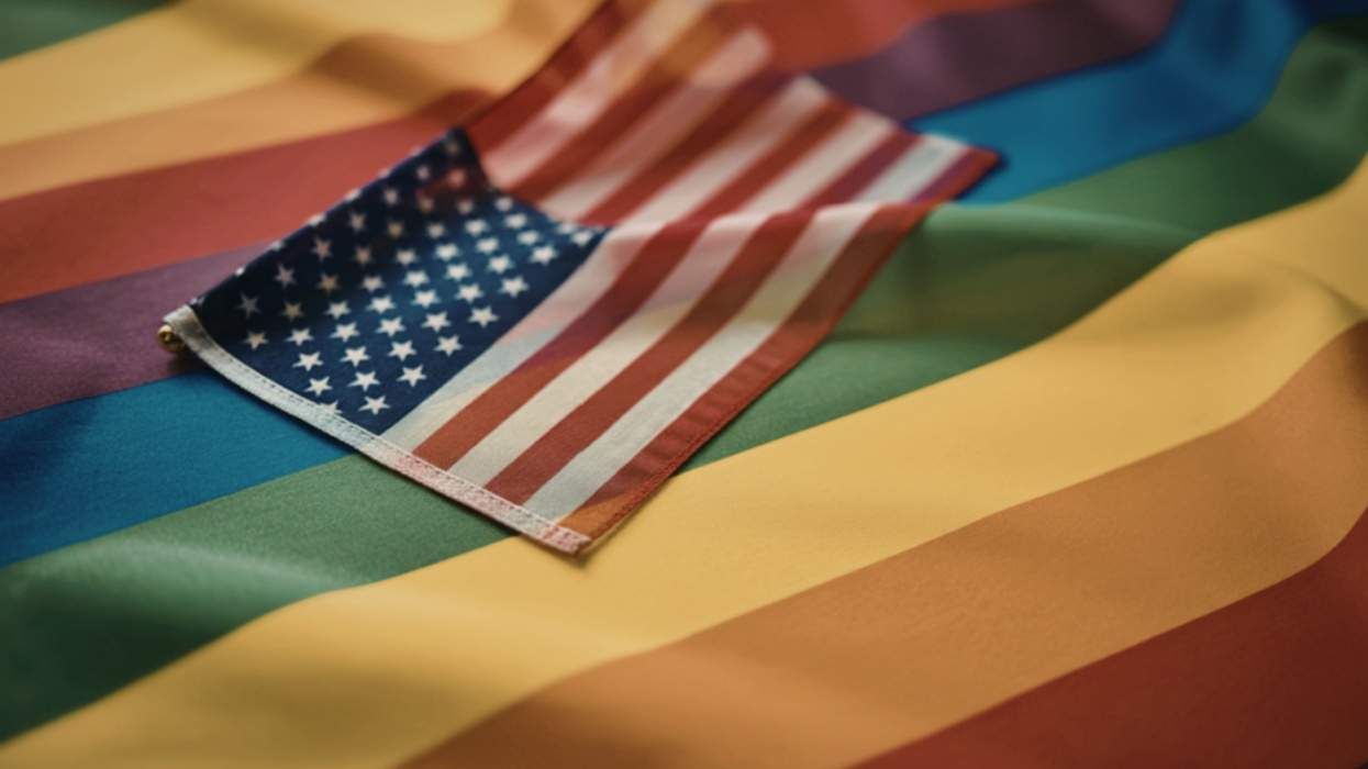 American flag on top of rainbow Pride flag