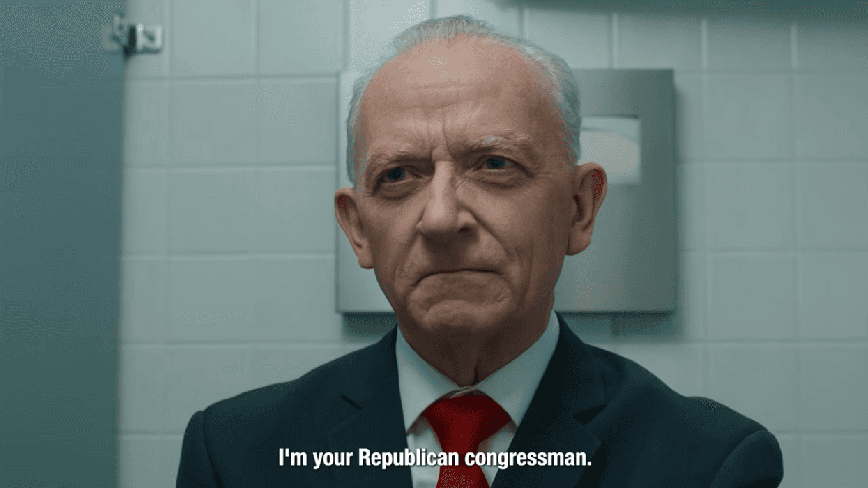 An actor in a suit and tie sitting in a bathroom stall with a caption that says, “I’m your Republican congressman.”