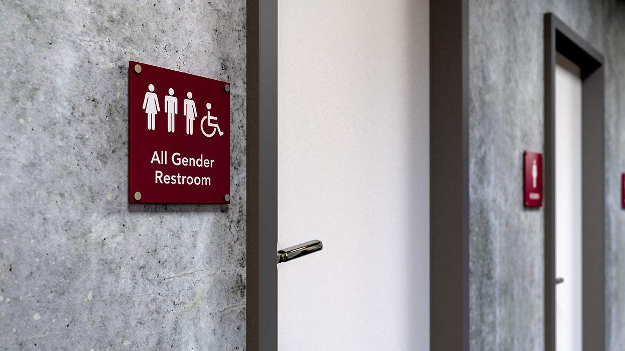 An all gender public restroom sign