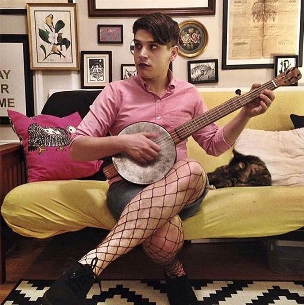 @andy_katz_ made a banjo, resonator is a steel cookie tin, neck is whittled cherry and walnut.