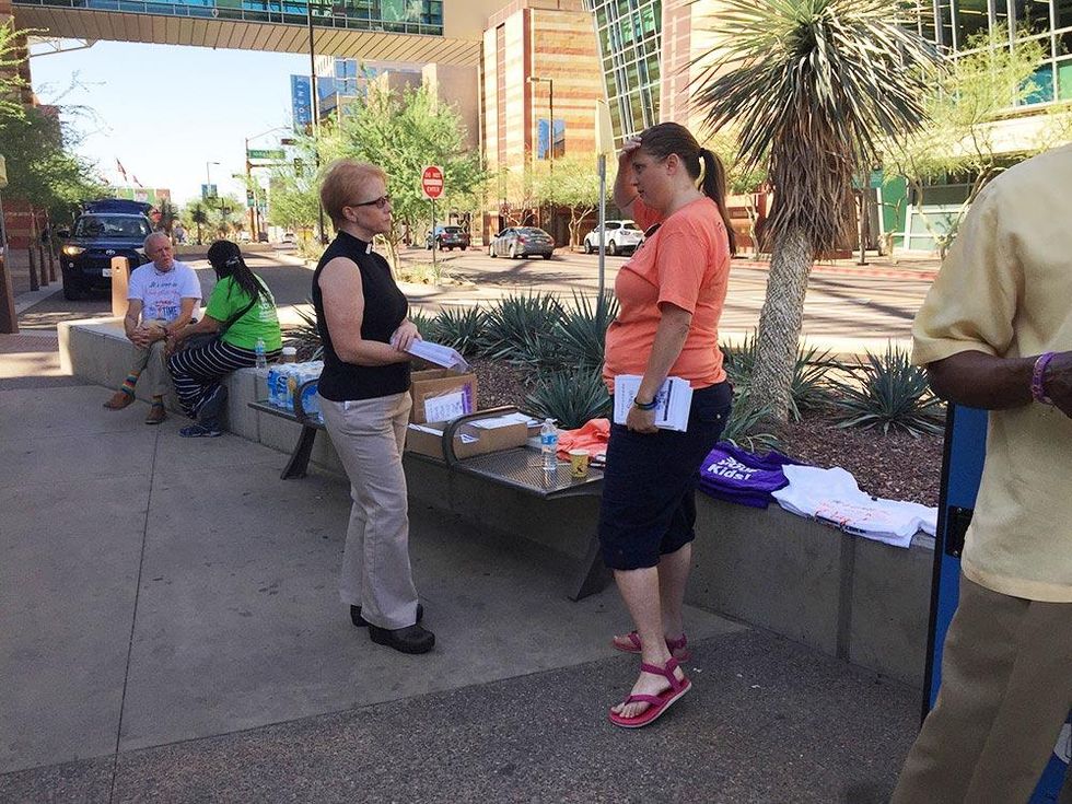 Another volunteer engages in conversation.