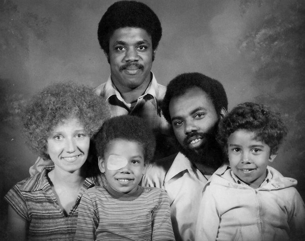 Anthony Adams (rear) with extended family - brother, sister in law, and their children
