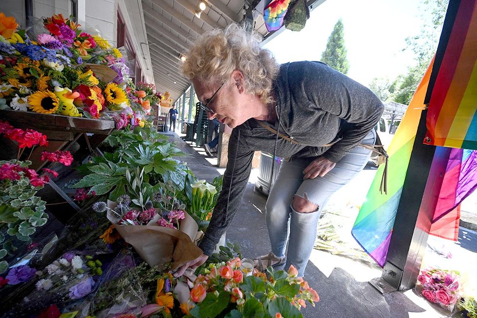 Anti transgender hate crimes public health emergency MagPi store flower LGBTQ flag memorial Laura Ann Carleton San Bernardino County
