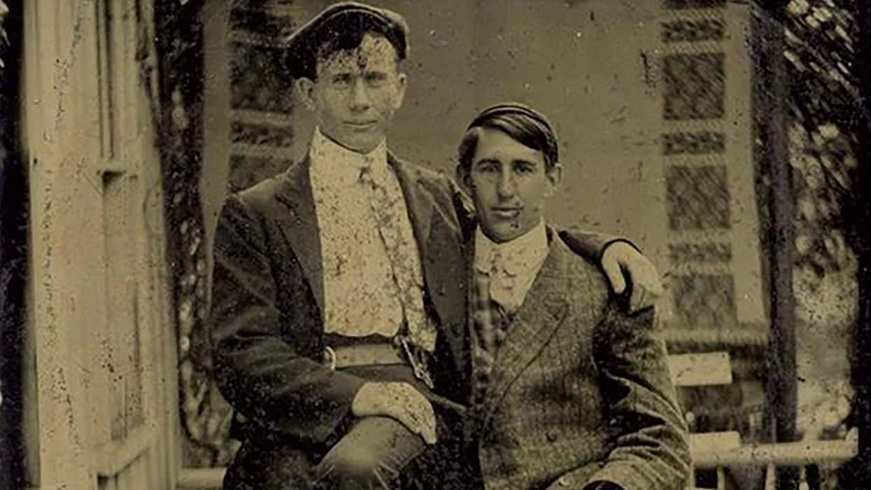 Archival pic of two gay men seated together
