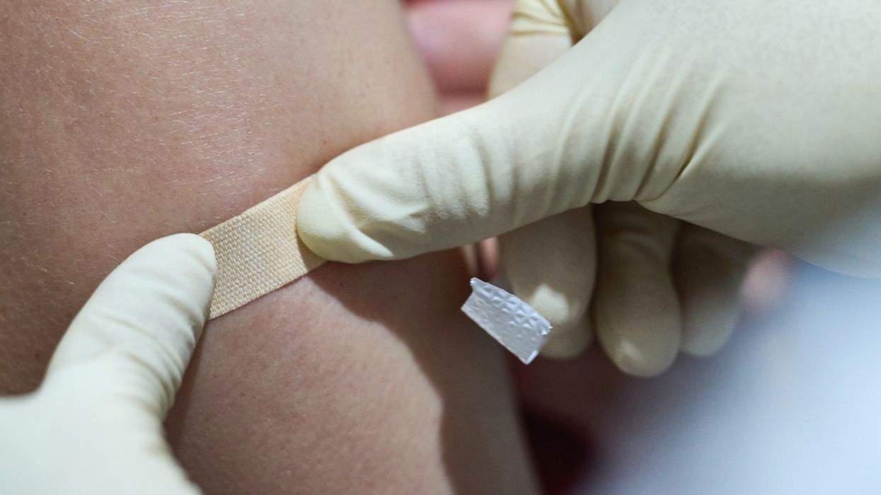 bandage stuck on arm