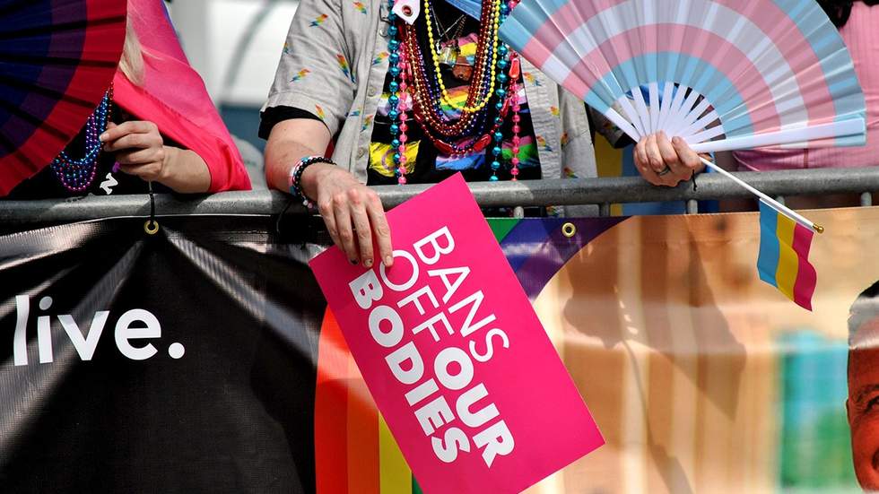 Bans off our bodies protect abortion sign LGBTQ pride parade celebration States with chance to protect abortion during election year