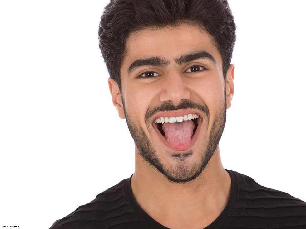 bearded happy man tongue out