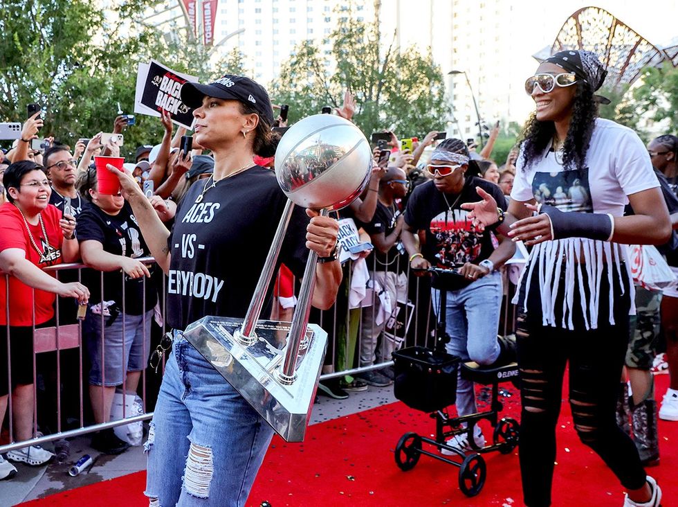 beginners guide to WNBA 2024 Alysha Clark Chelsea Gray Aja Wilson Las Vegas Aces walk red carpet championship trophy championship victory parade