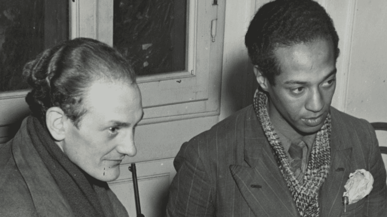 Black-and-white photo of Arne Hauptmann and Reed Peggram standing together