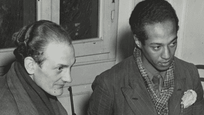 Black-and-white photo of Arne Hauptmann and Reed Peggram standing together