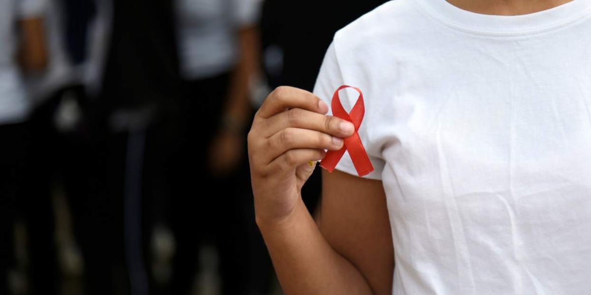 Black Americans are disproportionately criminalized for living with HIV. Here's how