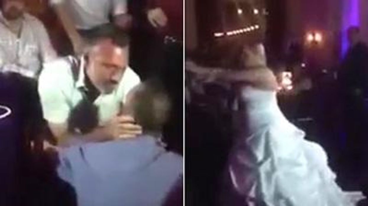 Bouquet-toss-at-san-diego-straight-wedding-ends-in-gay-proposal-x400