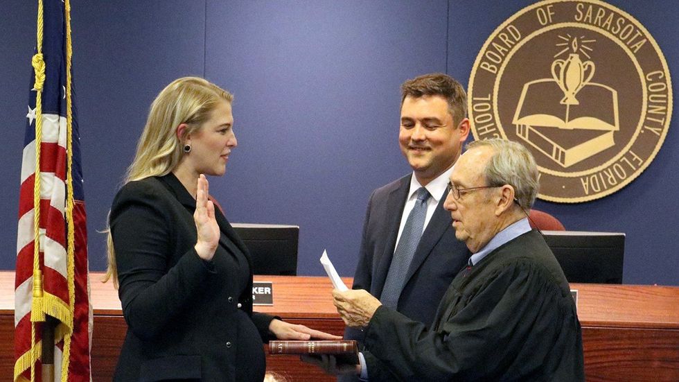 Bridget Ziegler Moms For Liberty Swearing In Ceremony Sarasota County School Board with husband Christian Ziegler and Judge