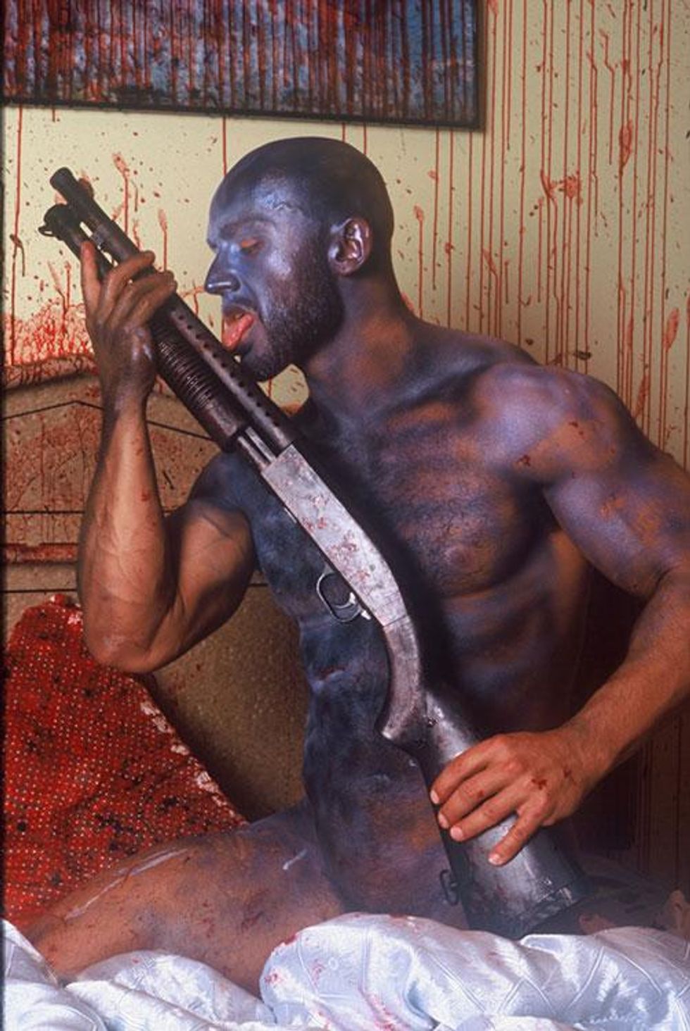 Bruce LaBruce, Fran\u00e7ois Sagat Licking Shotgun, 2009, courtesy of the artist and Tom of Finland Store