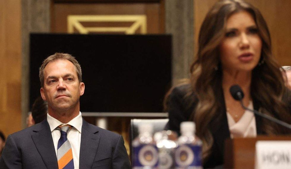 bryon noem behind kristi noem in congress