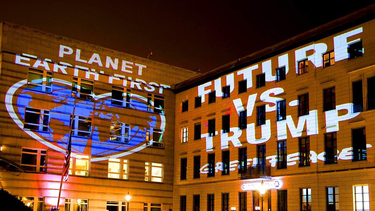 Building projection "Future vs Trump" Greenpeace protest.
