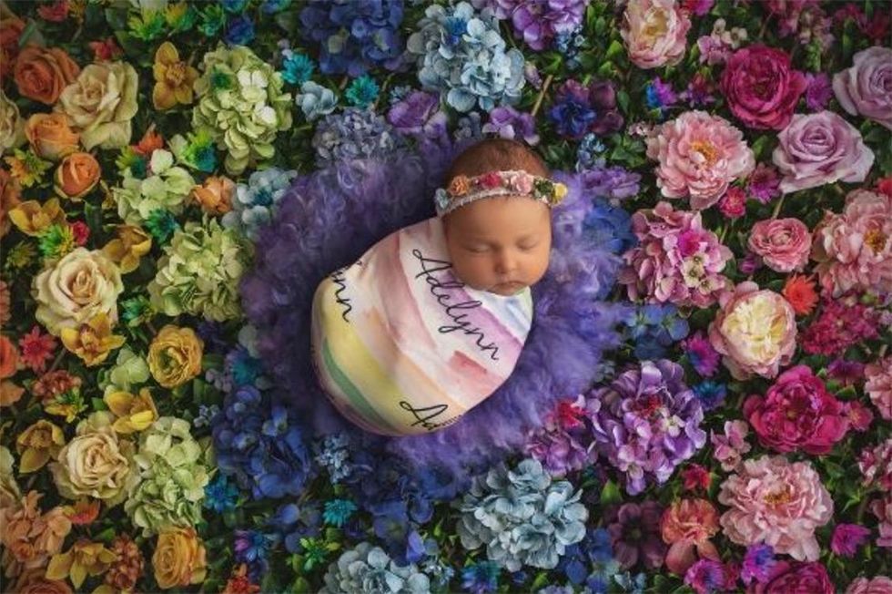 Buy a personalized Audrey\u2019s Bear Watercolor Rainbow Swaddle Blanket and the company donates one to a neonatal intensive care unit. ($29+, audreysbear.com)