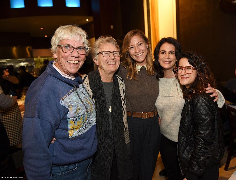 Caitlin Gerard (center)