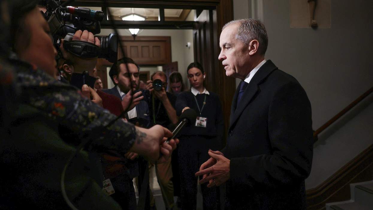 Canadian PM Mark Carney speaking to media outlets