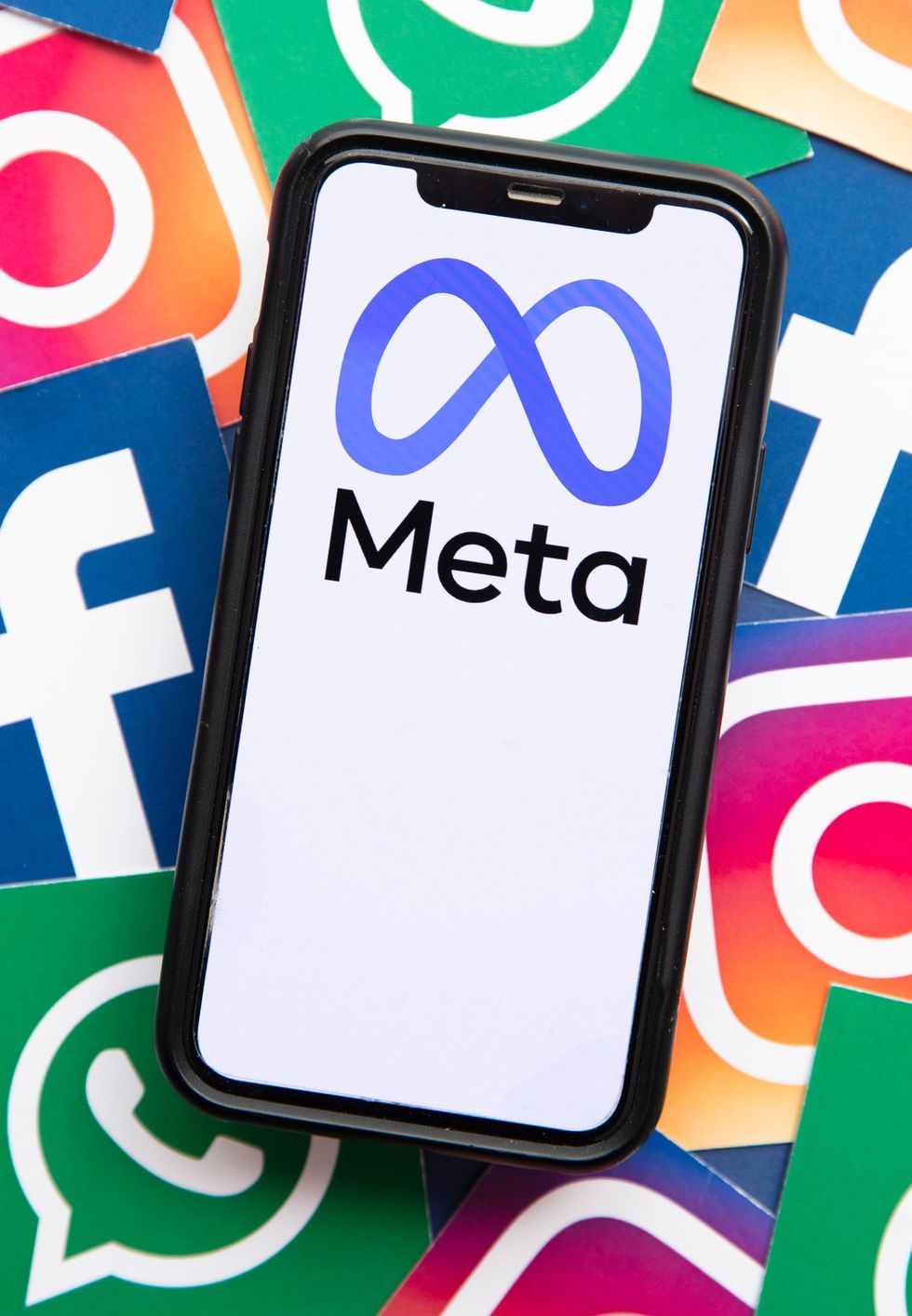 cellphone meta facebook instagram whatsapp logos OPED Cyberbullying Middle East targeting lgbtq people