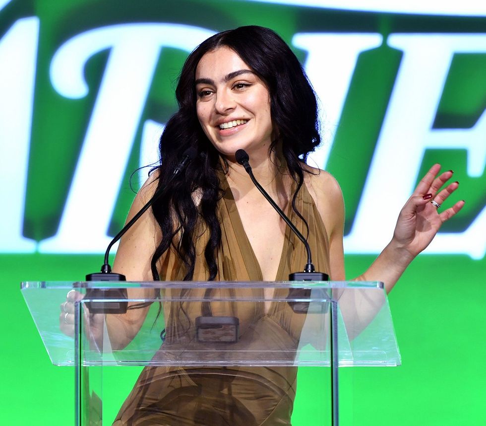 Charli XCX speaks onstage